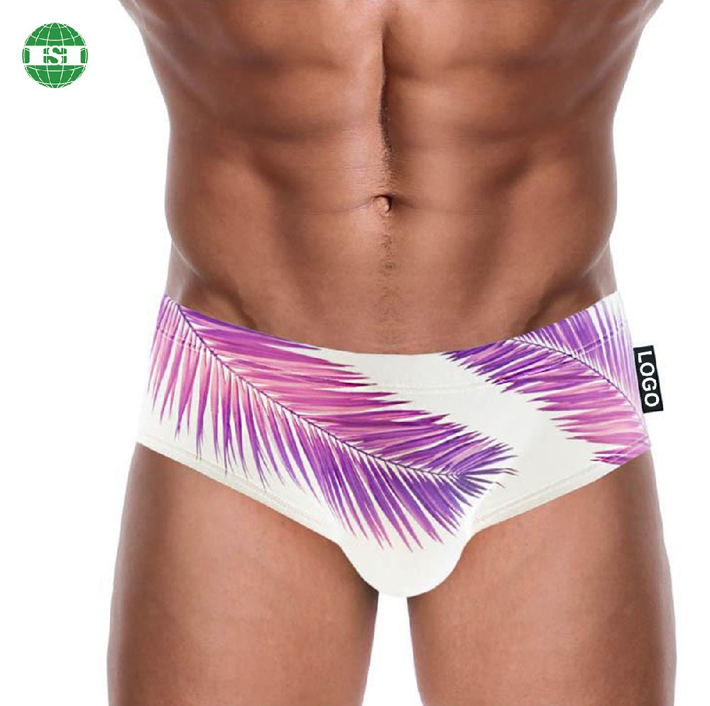 Pink palm tree print men's swimming briefs customized with your own design