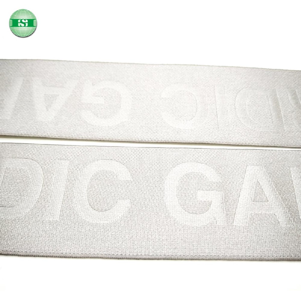 Debossed logo plain color elastic ribbon customised with your own letters